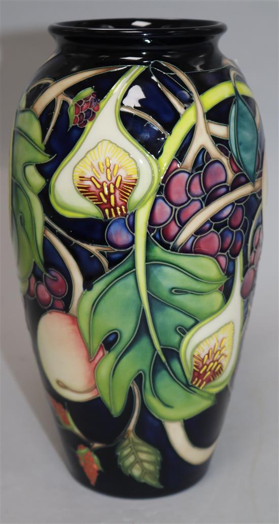 A Moorcroft fruit pattern vase height 23cm